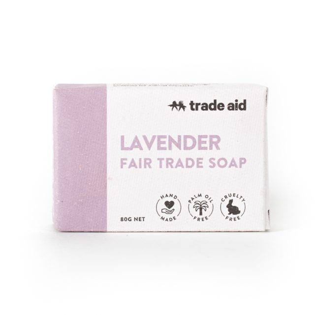Lavender fair trade soap bar with 'Trade Aid' branding on a white background