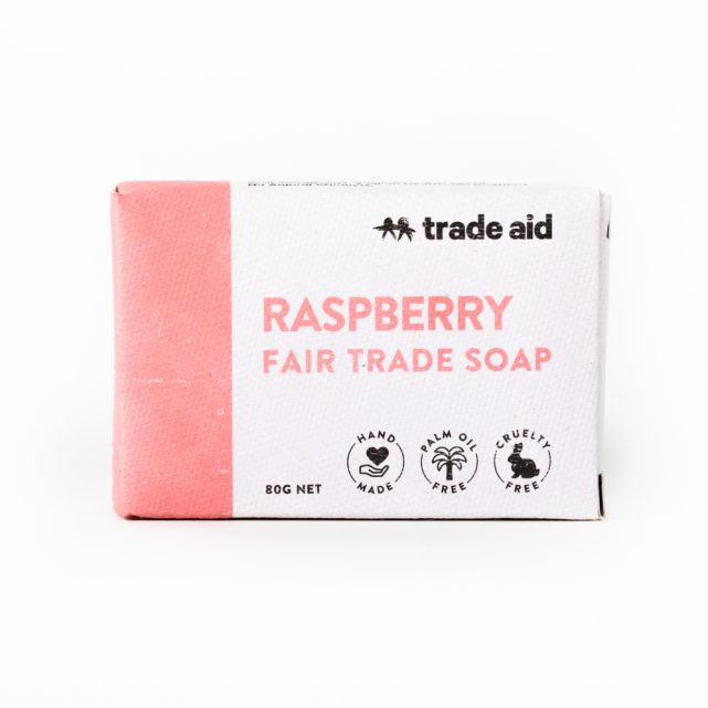 Raspberry Fair Trade Soap packaging with 'Trade Aid' branding on a white background