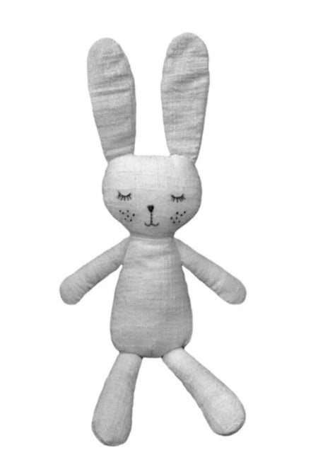 Grey soft toy bunny rabbit on white background