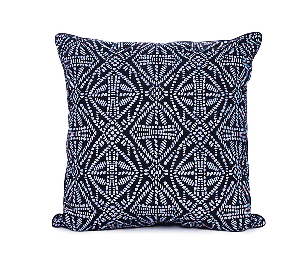 Hand-screened Kim Soo black and white cushion cover with piping detail, on white background