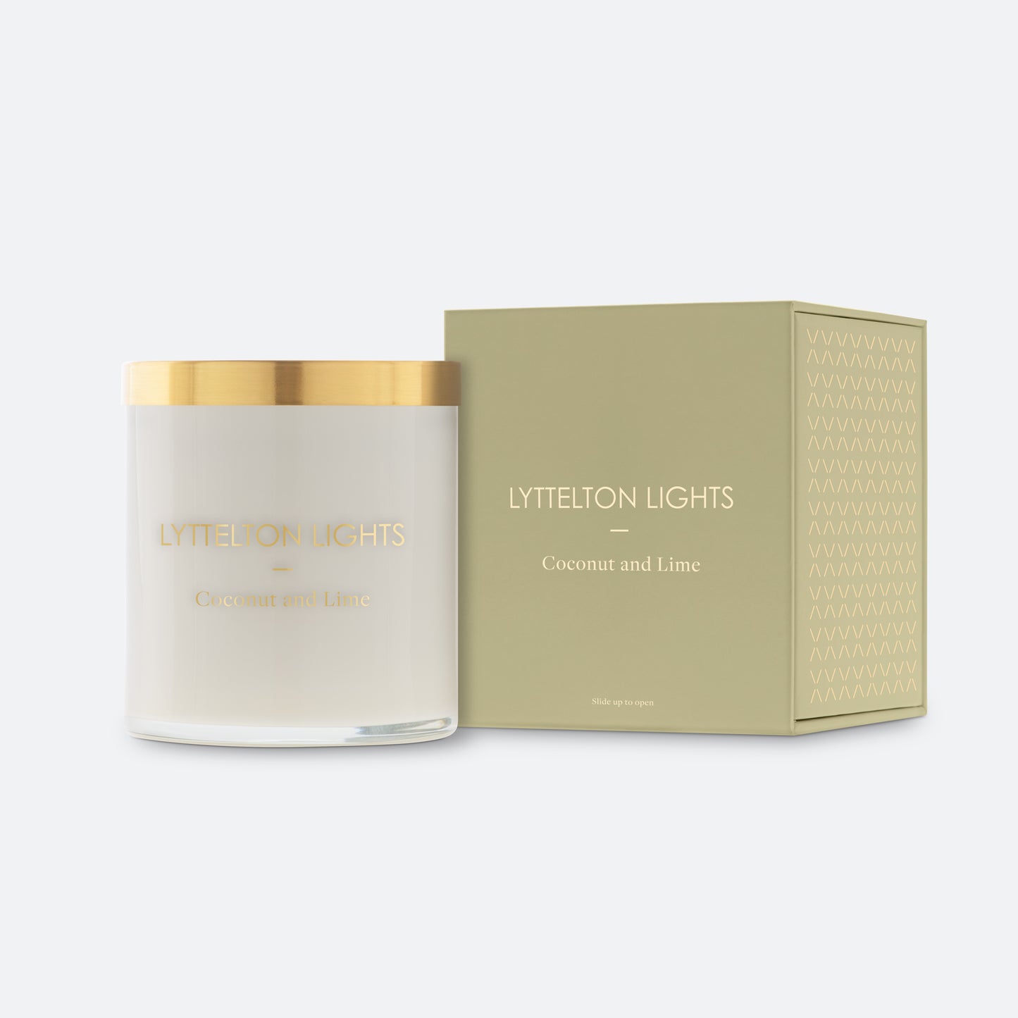 Lyttelton Lights Coconut and Lime candle with gold lid and matching green packaging on a white background