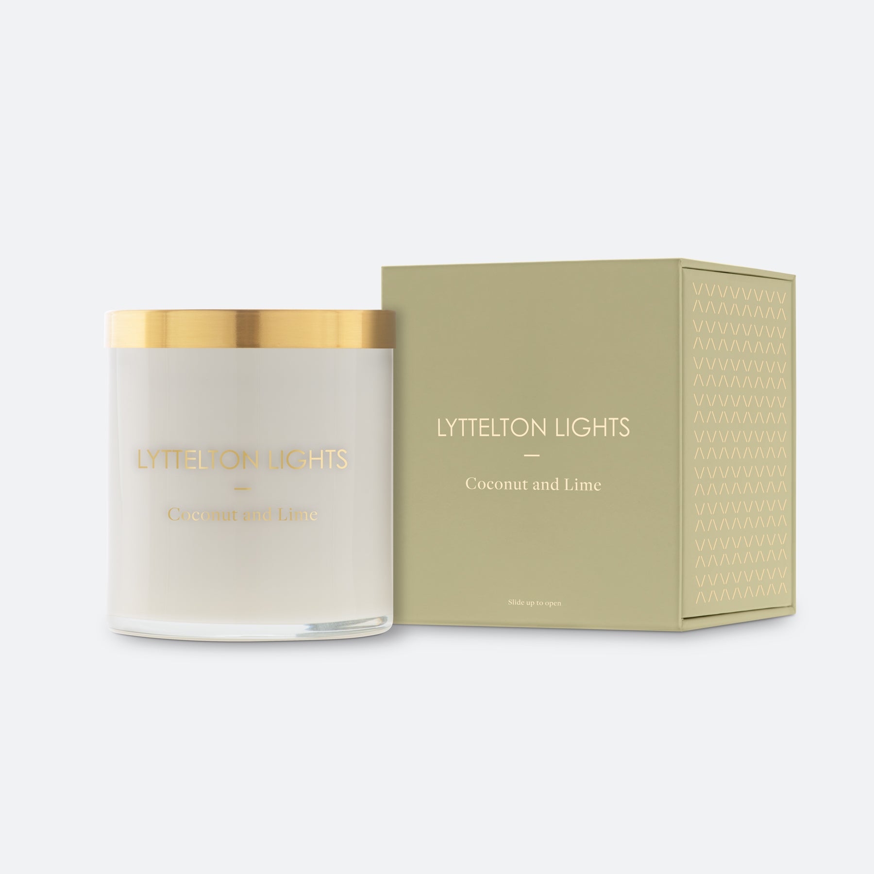 Lyttelton Lights Coconut and Lime candle with gold lid and matching green packaging on a white background