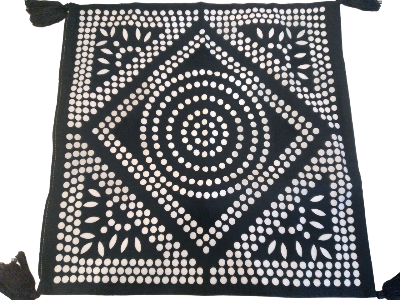 Hand-screened Kim Soo cushion cover with black tassel detail on white background