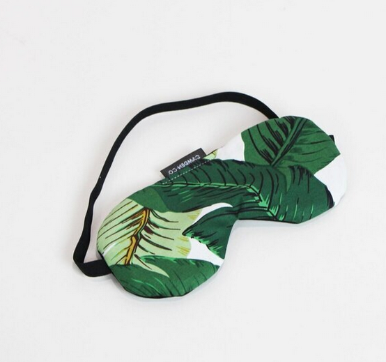 green leafy sleeping eye mask by camden and co on a white background