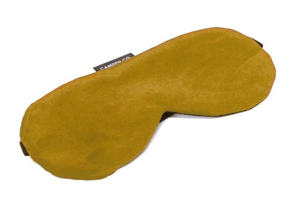 mustard coloured sleeping eye mask by camden and co on a white background